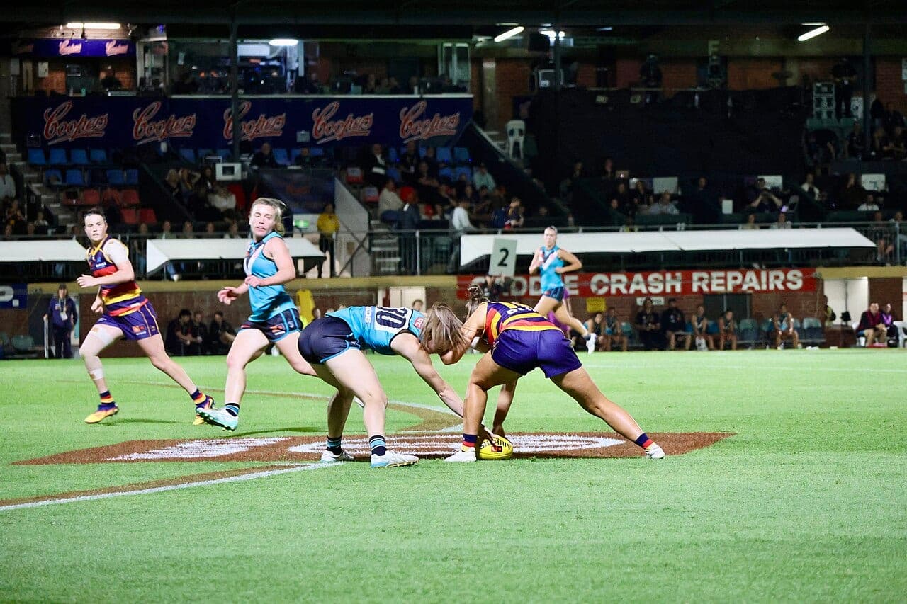 Port Adelaide players in action during a 2025 AFLW match against Adelaide (file photo).